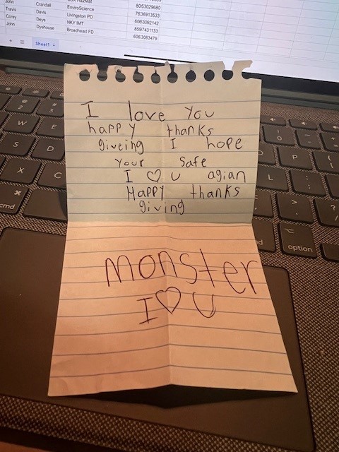 A note from Tyler Hill's daughter that she sent to him when he was deployed to a train derailment in Rockcastle County over Thanksgiving. The note reads, "I love you. Happy thanksgiving. I hope you're safe. I love you again. Happy Thanksgiving. Monster I love you.